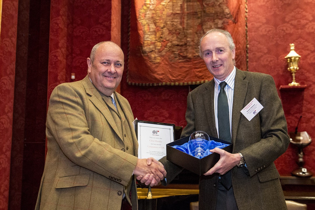 Clive Humby being awarded Companion of OR 2014 with Stewart Robinson