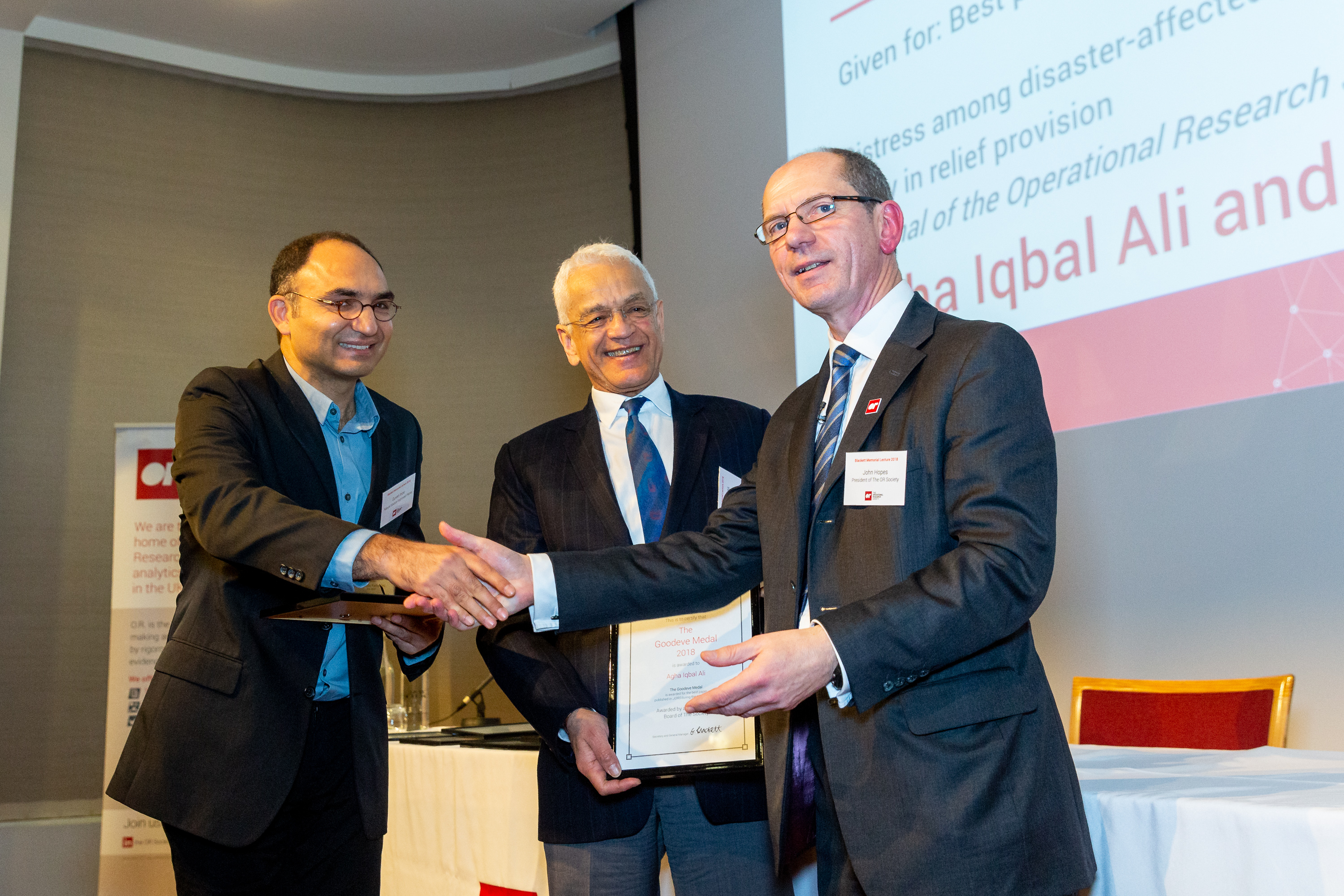 Agha Iqbal Ali and Guven Ince winners of 2018 Goodeve Medal with John Hopes.