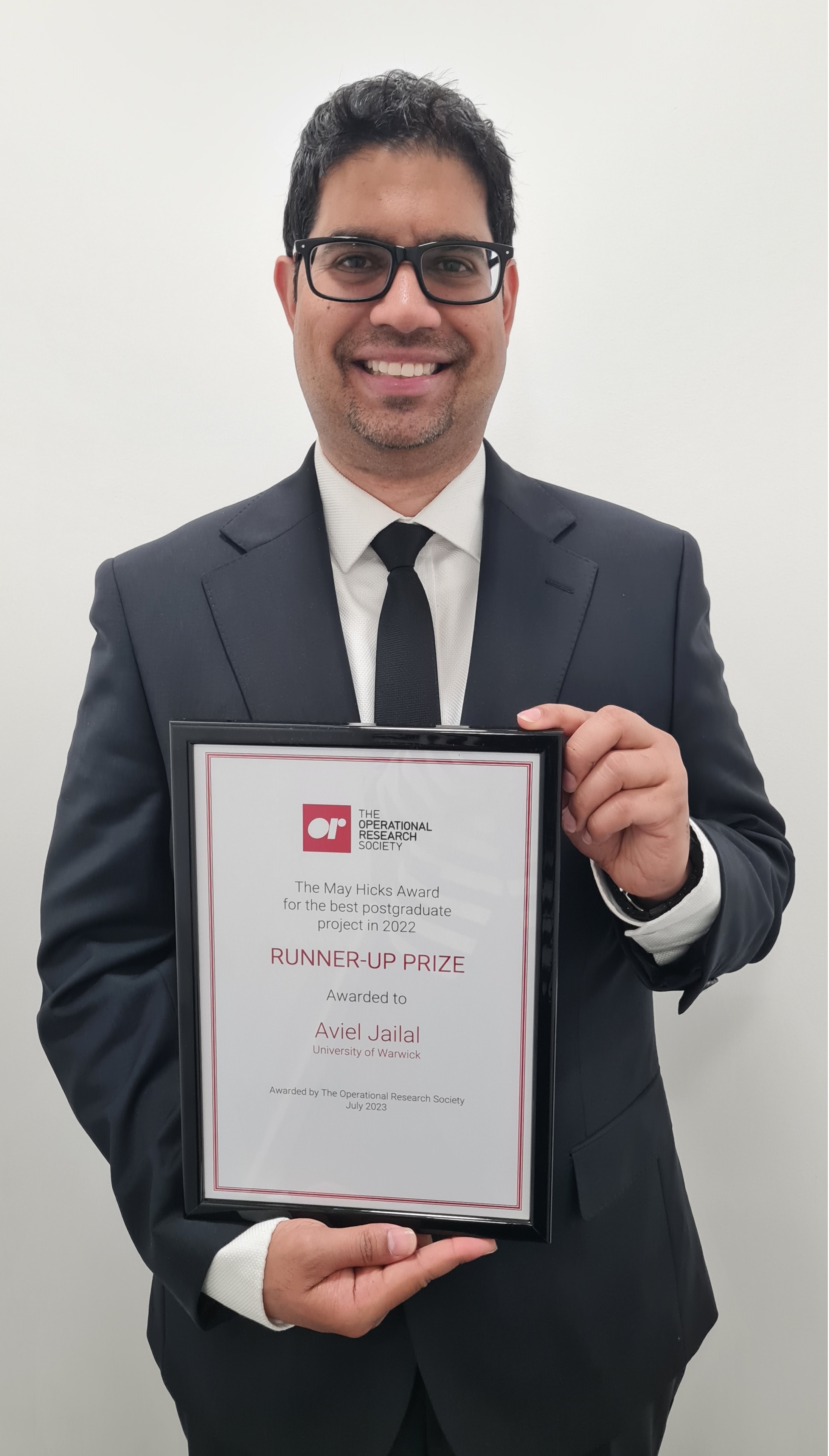 AJ shot with certificate_MayHicks_23.jpg